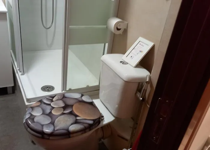 Quarto em Acomodações Particulares Habitación Individual Con Tv Centro